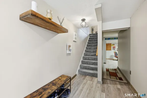 a view of entryway with wooden floor