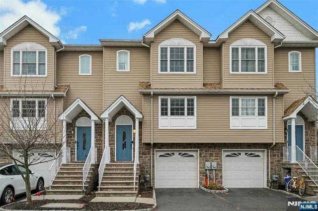 a view of a house with a street