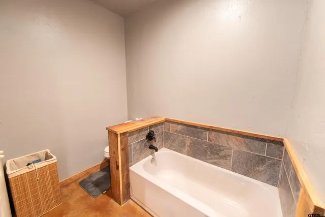 a bathroom with a bathtub