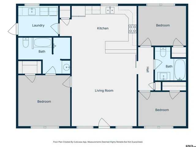 a black and white photo of a bed