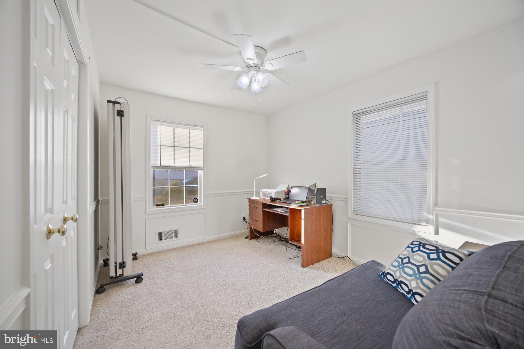 1003 Lee Road Glen Burnie, MD 21061 - Photo 22 of 44 a living room with furniture and a window