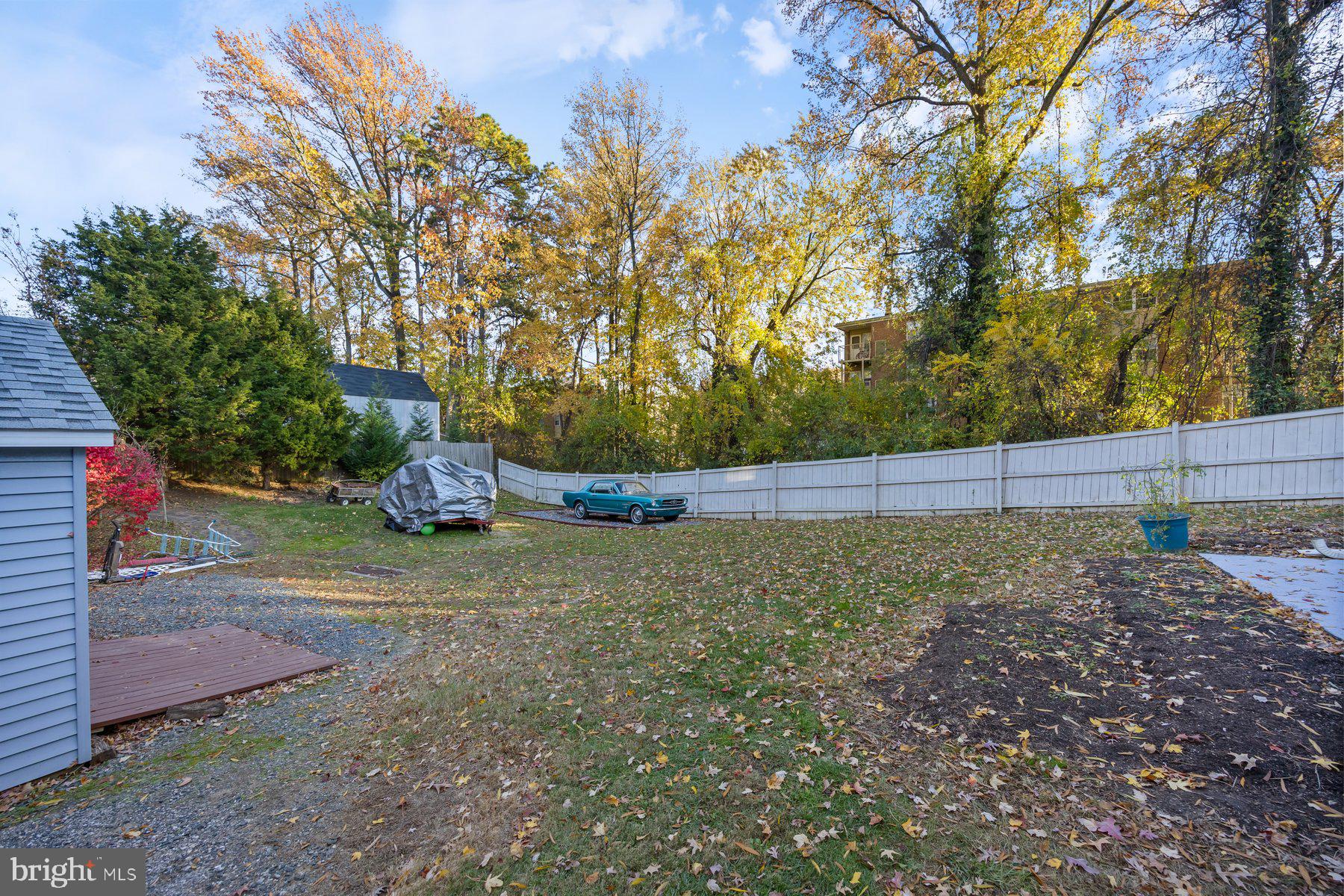 1003 Lee Road Glen Burnie, MD 21061 - Photo 41 of 44 a backyard of a house with lots of green space