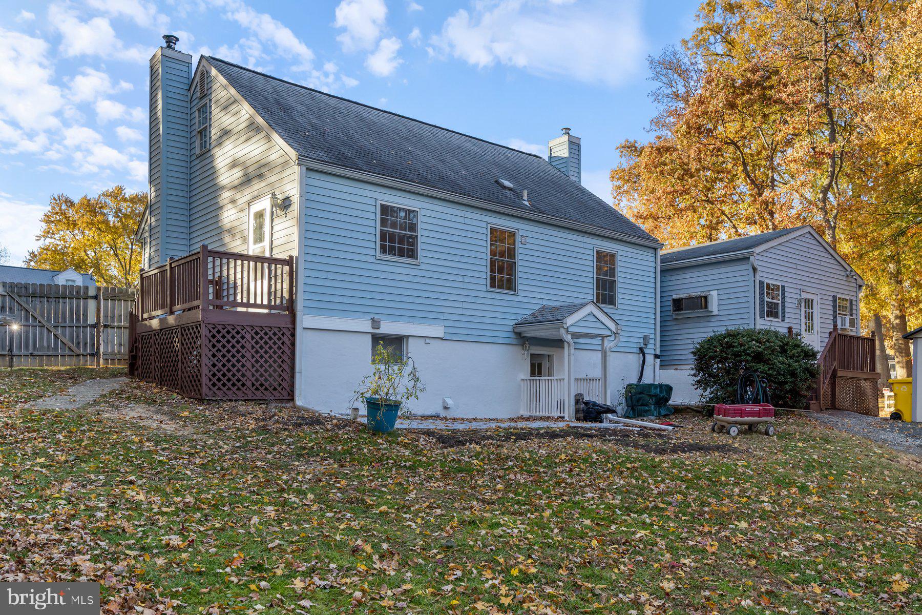 1003 Lee Road Glen Burnie, MD 21061 - Photo 44 of 44 a front view of a house with a yard