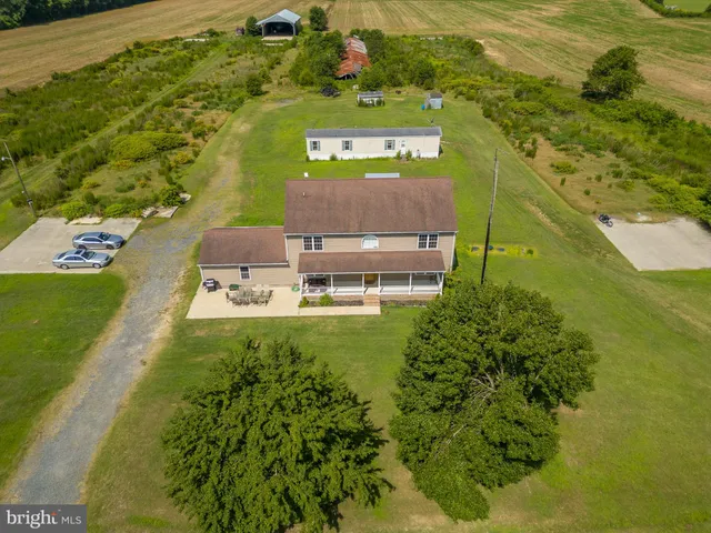 a view of a house with a big yard