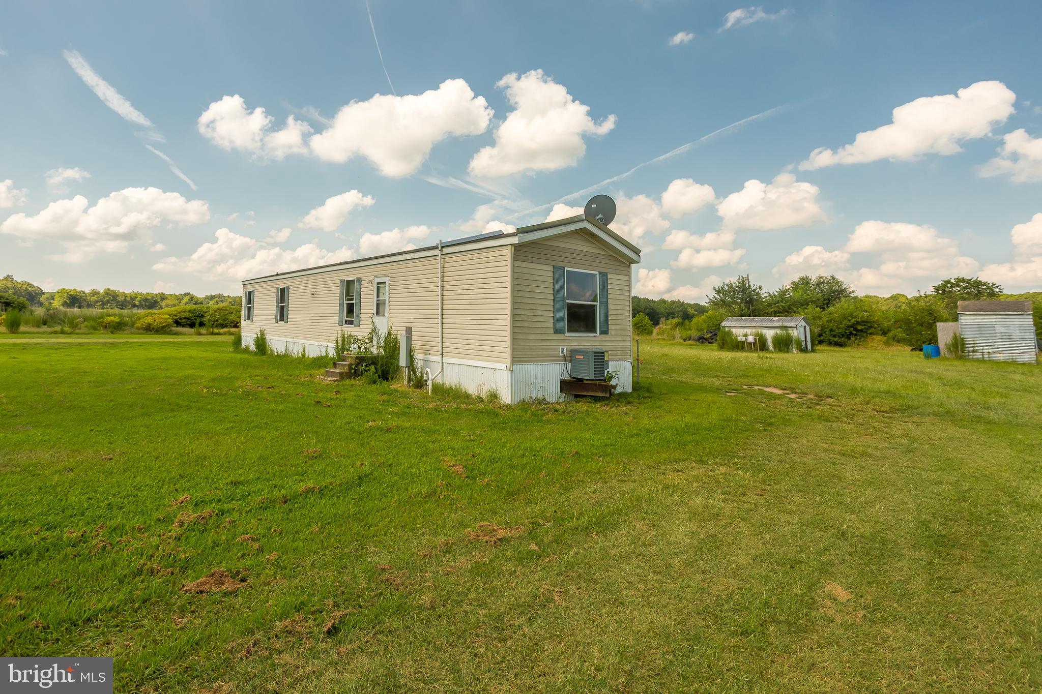 6629 Bowden Road Newark, MD 21841 - Photo 18 of 63 a view of a house with a big yard