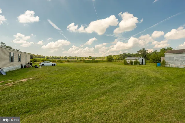 a view of a two room with windows