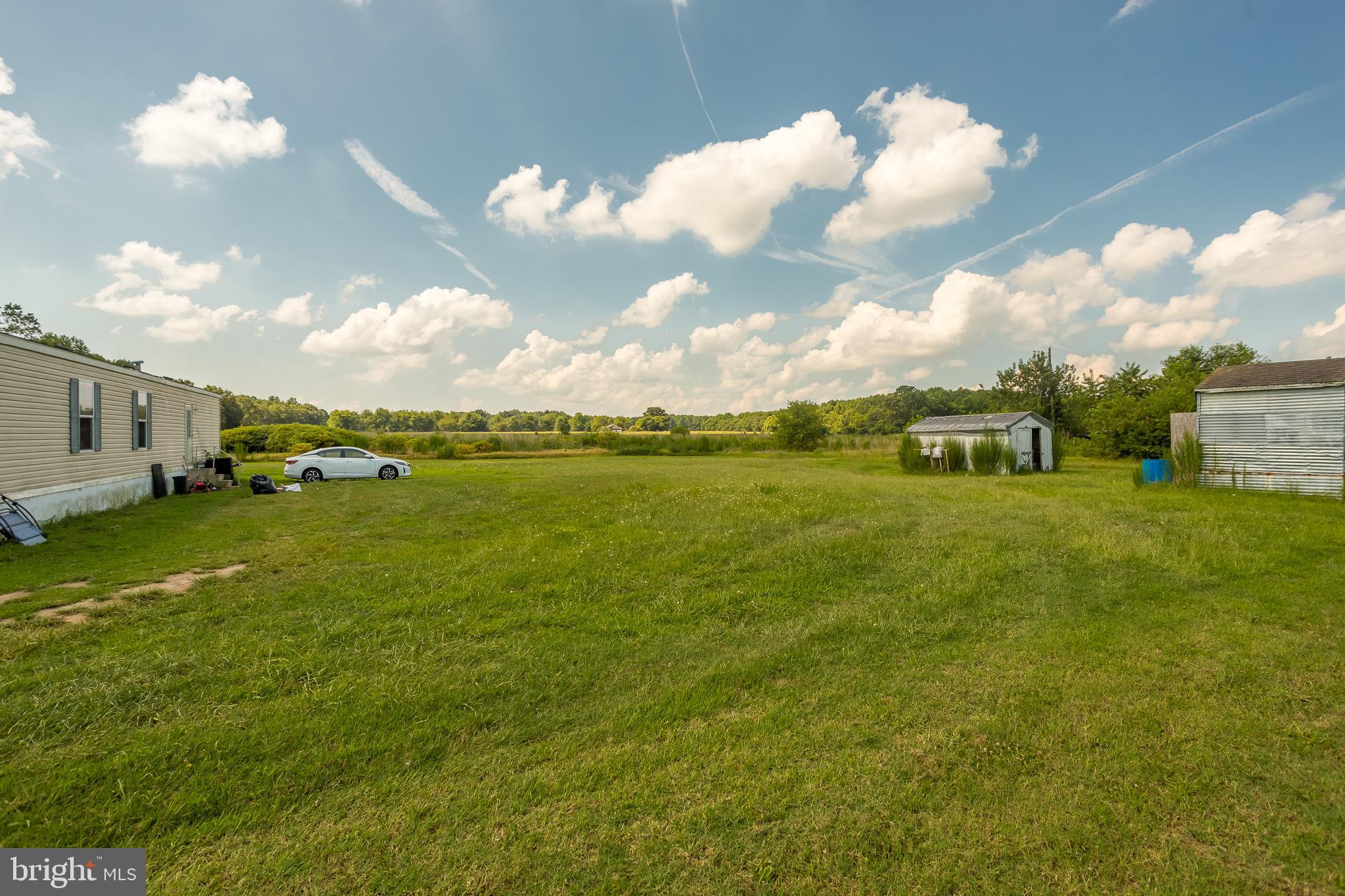 6629 Bowden Road Newark, MD 21841 - Photo 19 of 63 a view of a lake with houses