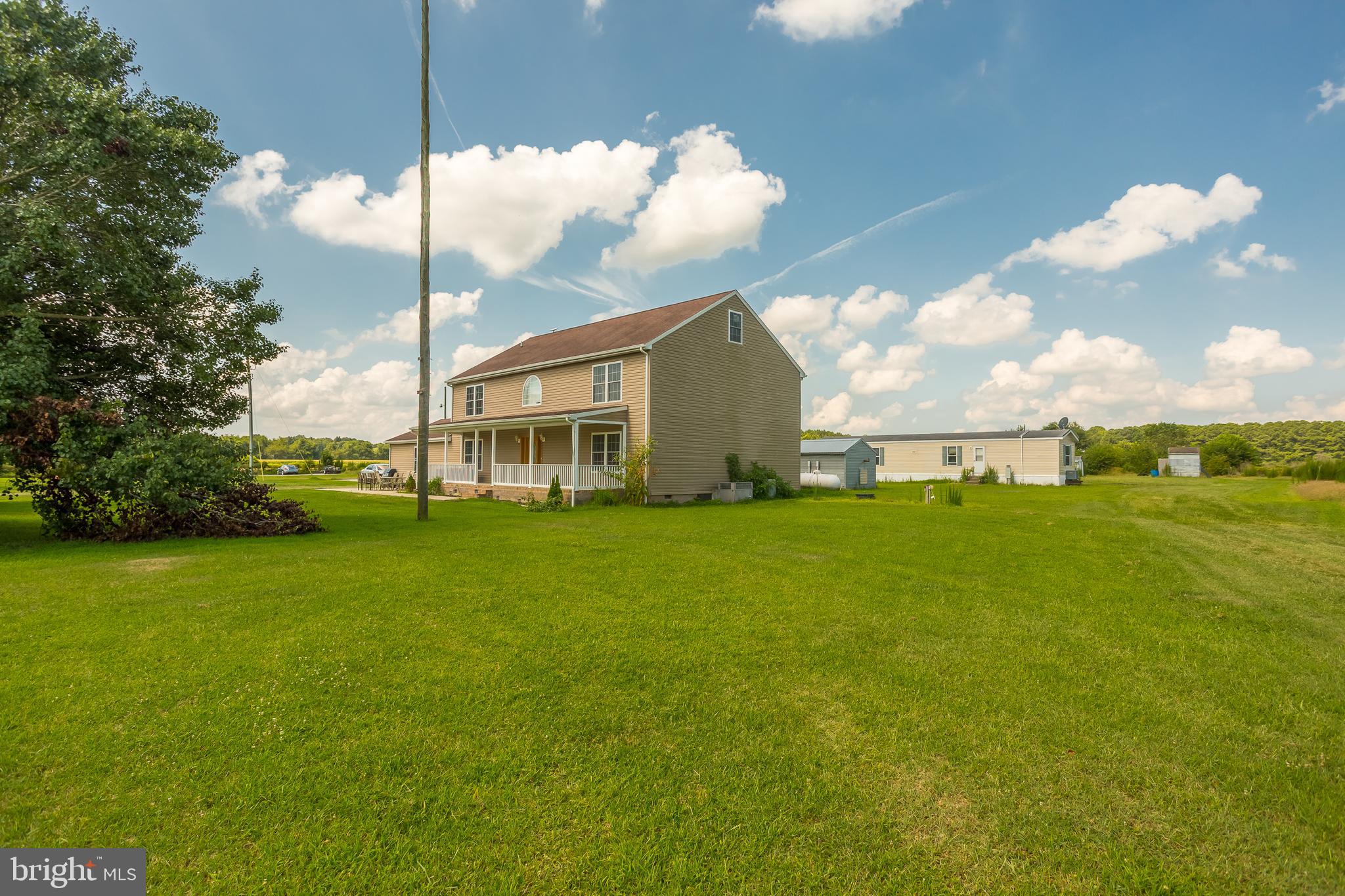 6629 Bowden Road Newark, MD 21841 - Photo 21 of 63 a view of a house with a big yard