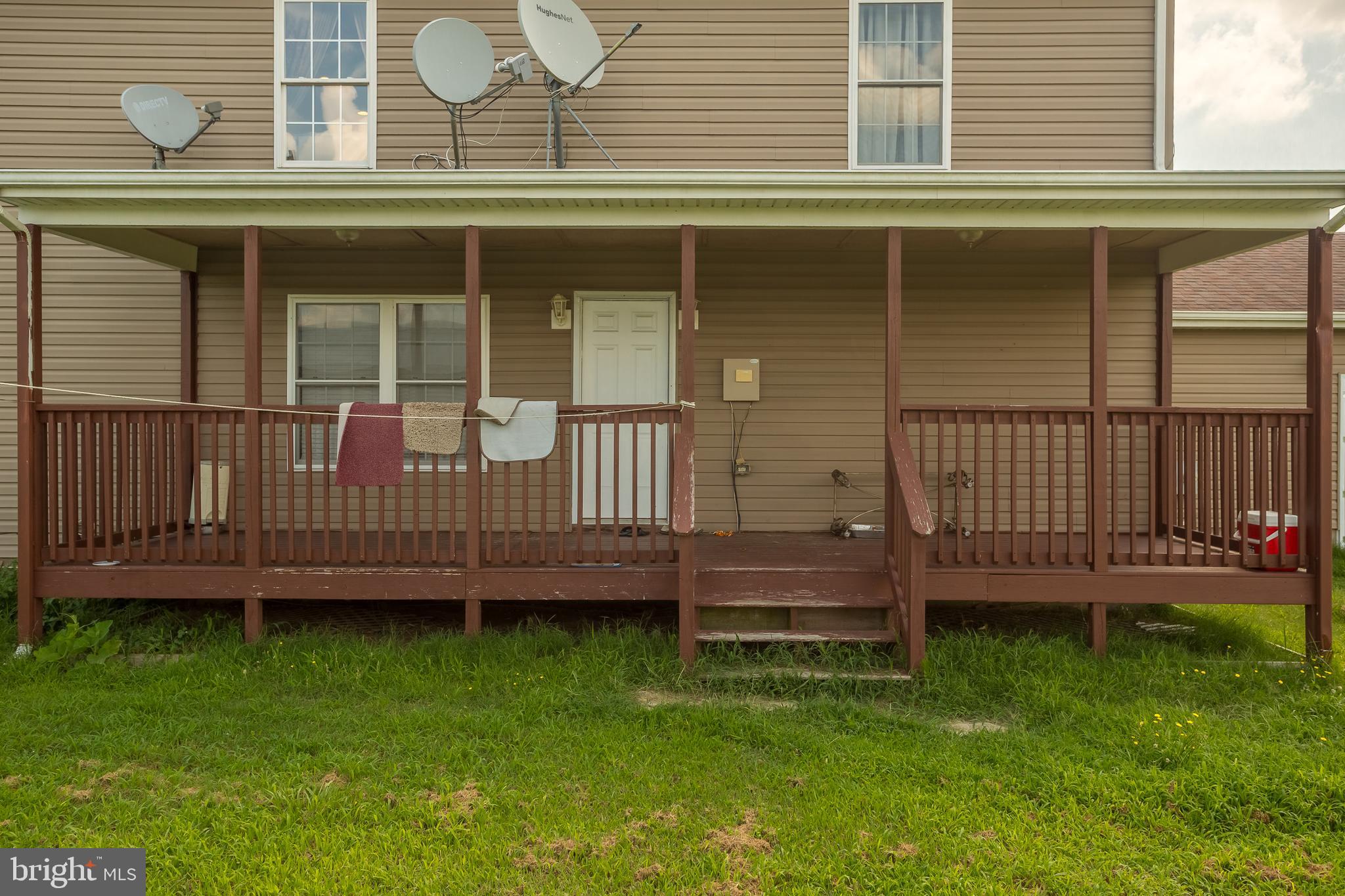 6629 Bowden Road Newark, MD 21841 - Photo 26 of 63 a view of a house with a backyard