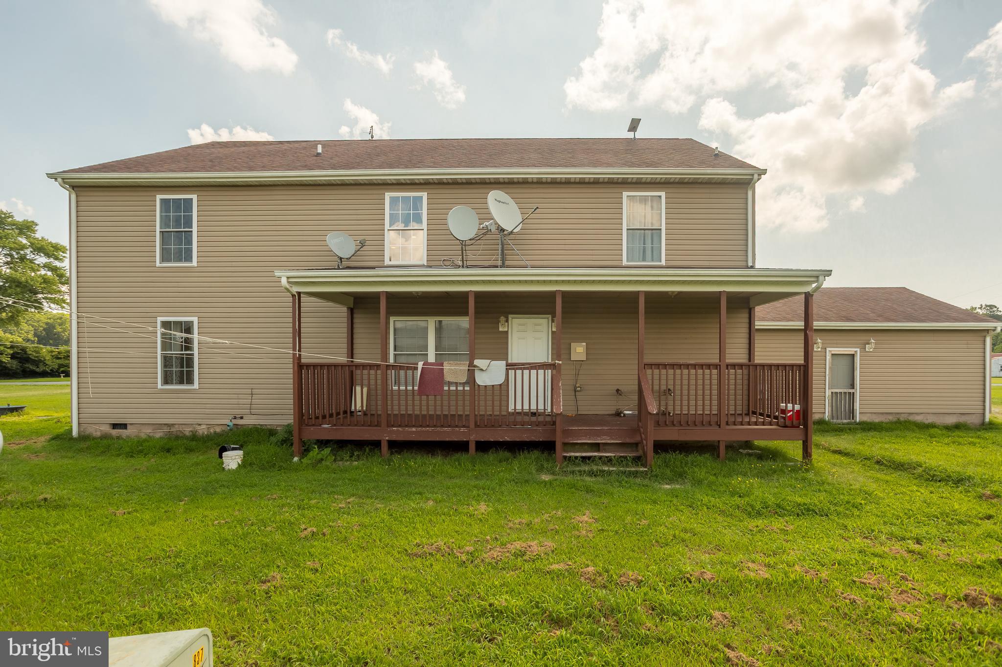 6629 Bowden Road Newark, MD 21841 - Photo 27 of 63 a view of a house with a backyard