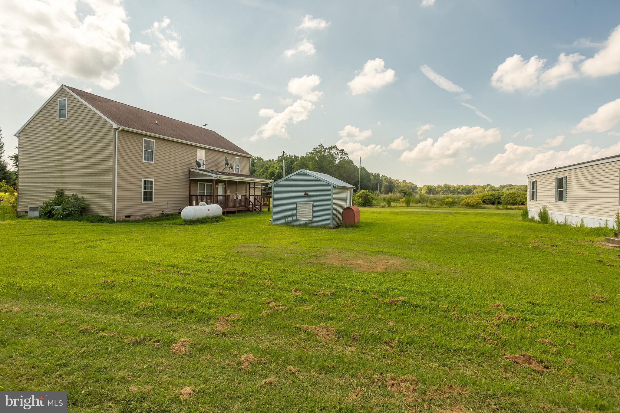 6629 Bowden Road Newark, MD 21841 - Photo 28 of 63 a front view of house with yard