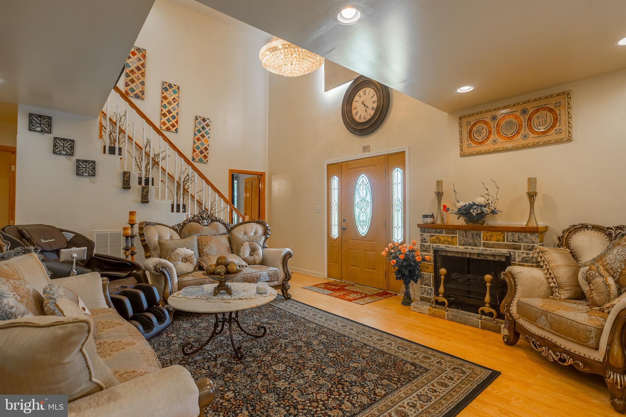 6629 Bowden Road Newark, MD 21841 - Photo 35 of 63 a living room with furniture and wooden floor