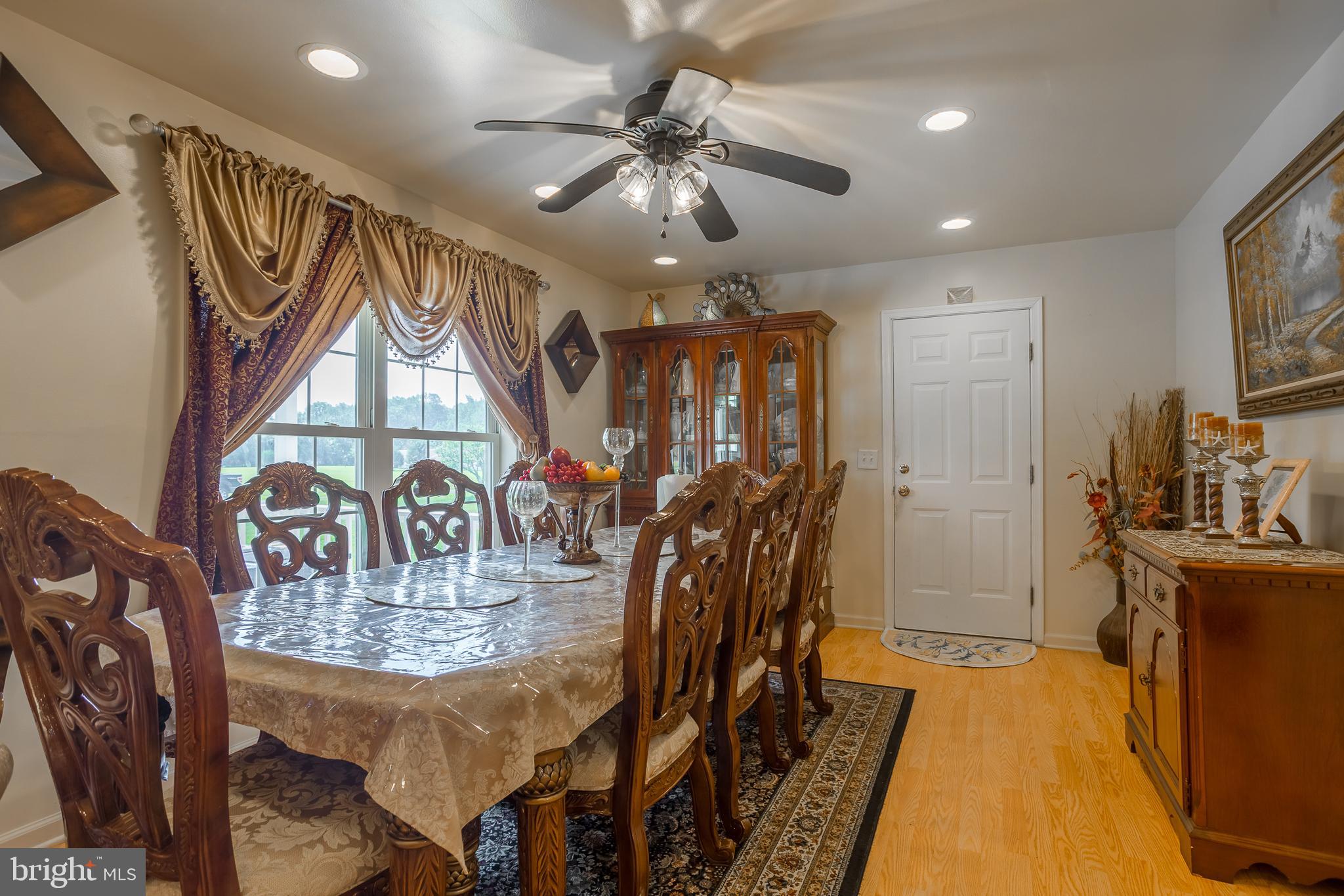 6629 Bowden Road Newark, MD 21841 - Photo 36 of 63 a view of a dining room with furniture