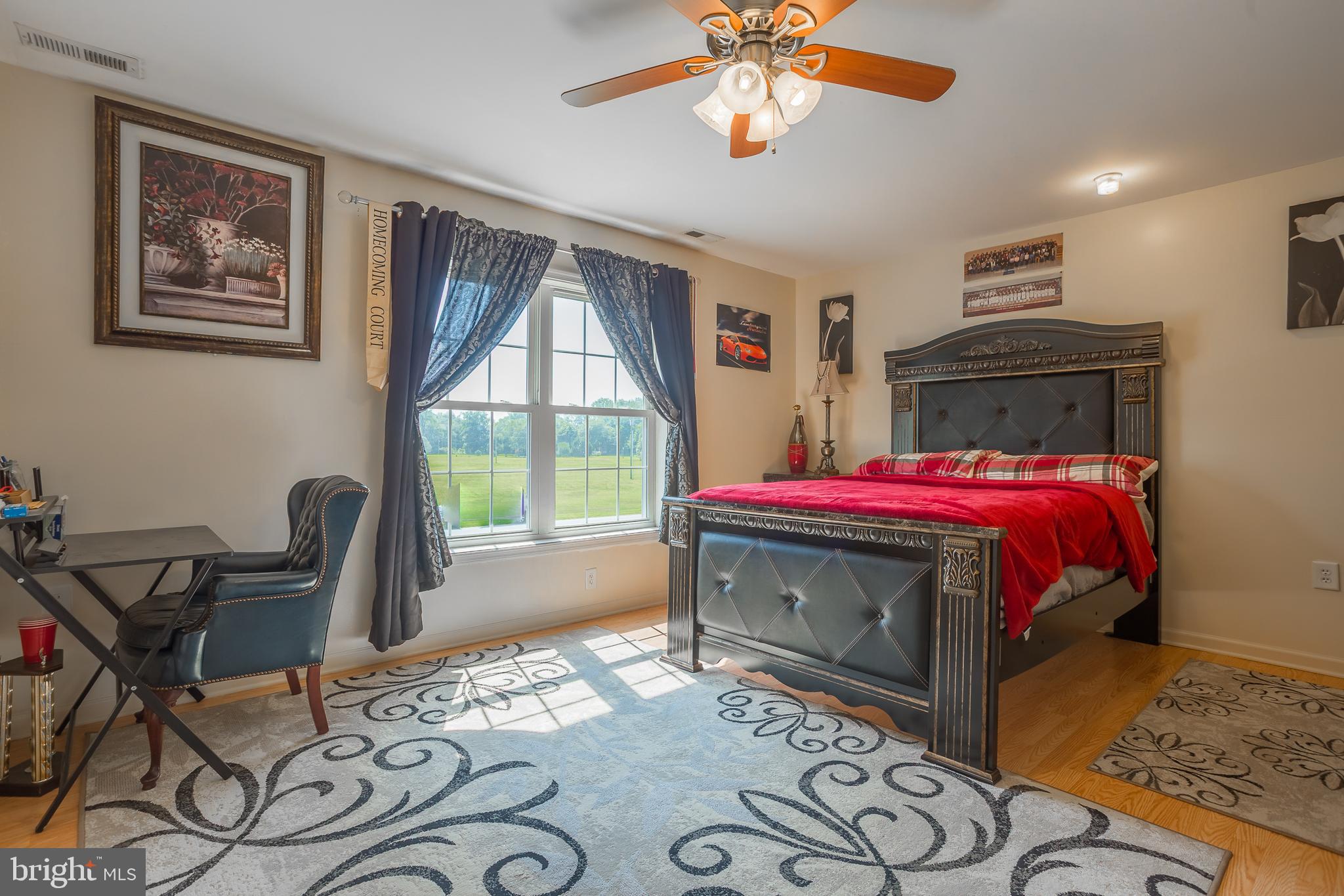 6629 Bowden Road Newark, MD 21841 - Photo 55 of 63 a bedroom with a bed and a window