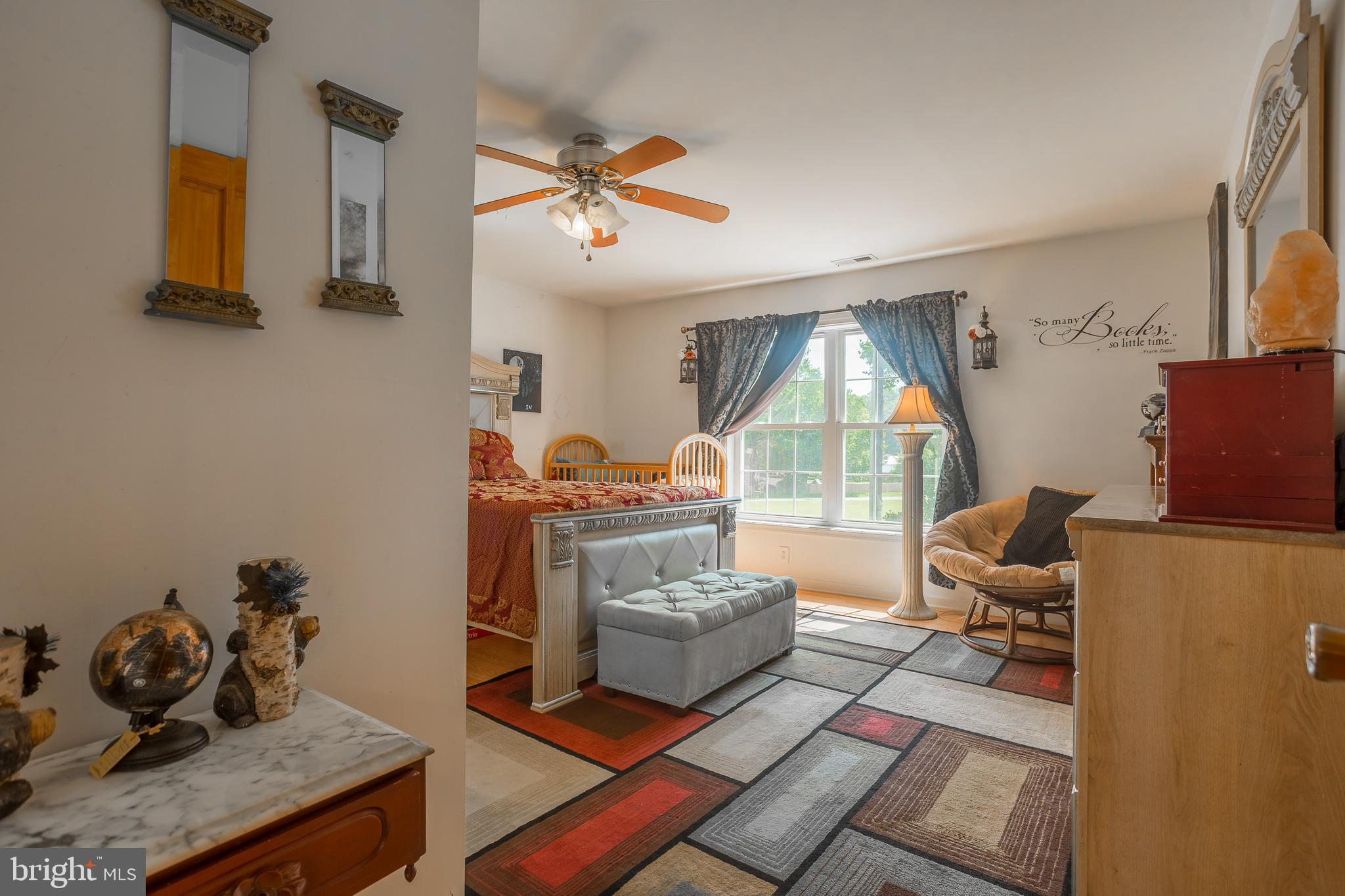 6629 Bowden Road Newark, MD 21841 - Photo 60 of 63 a living room with furniture and a window