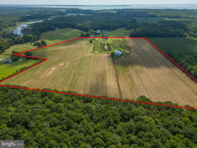 a view of a pool table and chairs