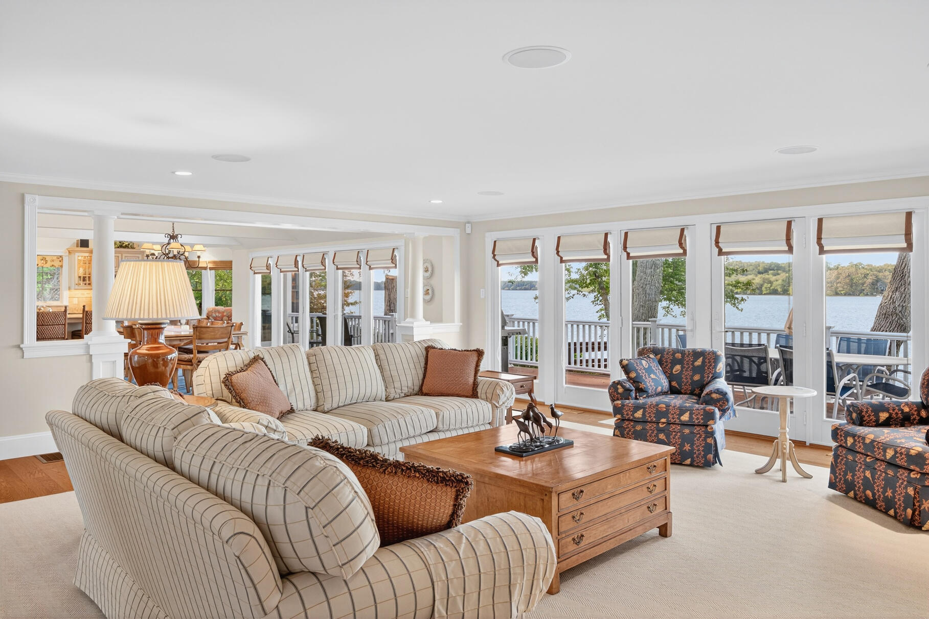 10 Brian Way Harwich, MA 02645 - Photo 16 of 76 a living room with furniture and large windows