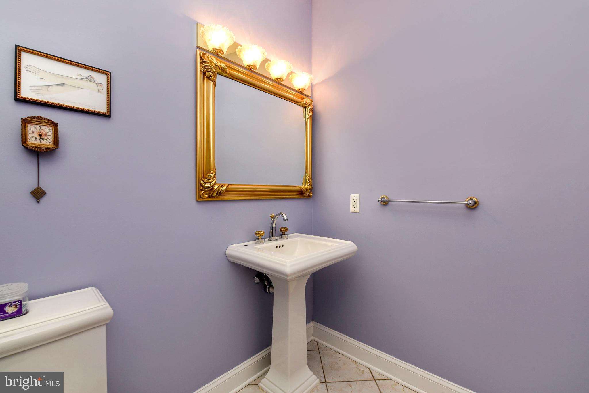 3919 Crosswicks Hamilton Square Road Trenton, NJ 08620 - Photo 22 of 61 a bathroom with a sink a mirror and a toilet