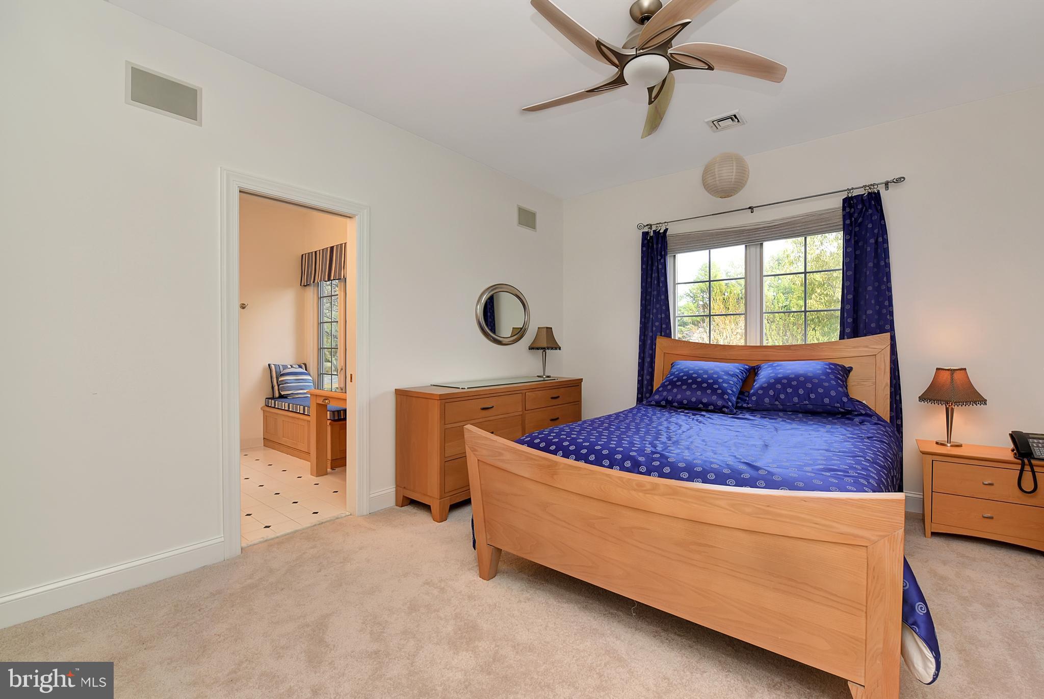 3919 Crosswicks Hamilton Square Road Trenton, NJ 08620 - Photo 30 of 61 a bed room with a bed and a chandelier