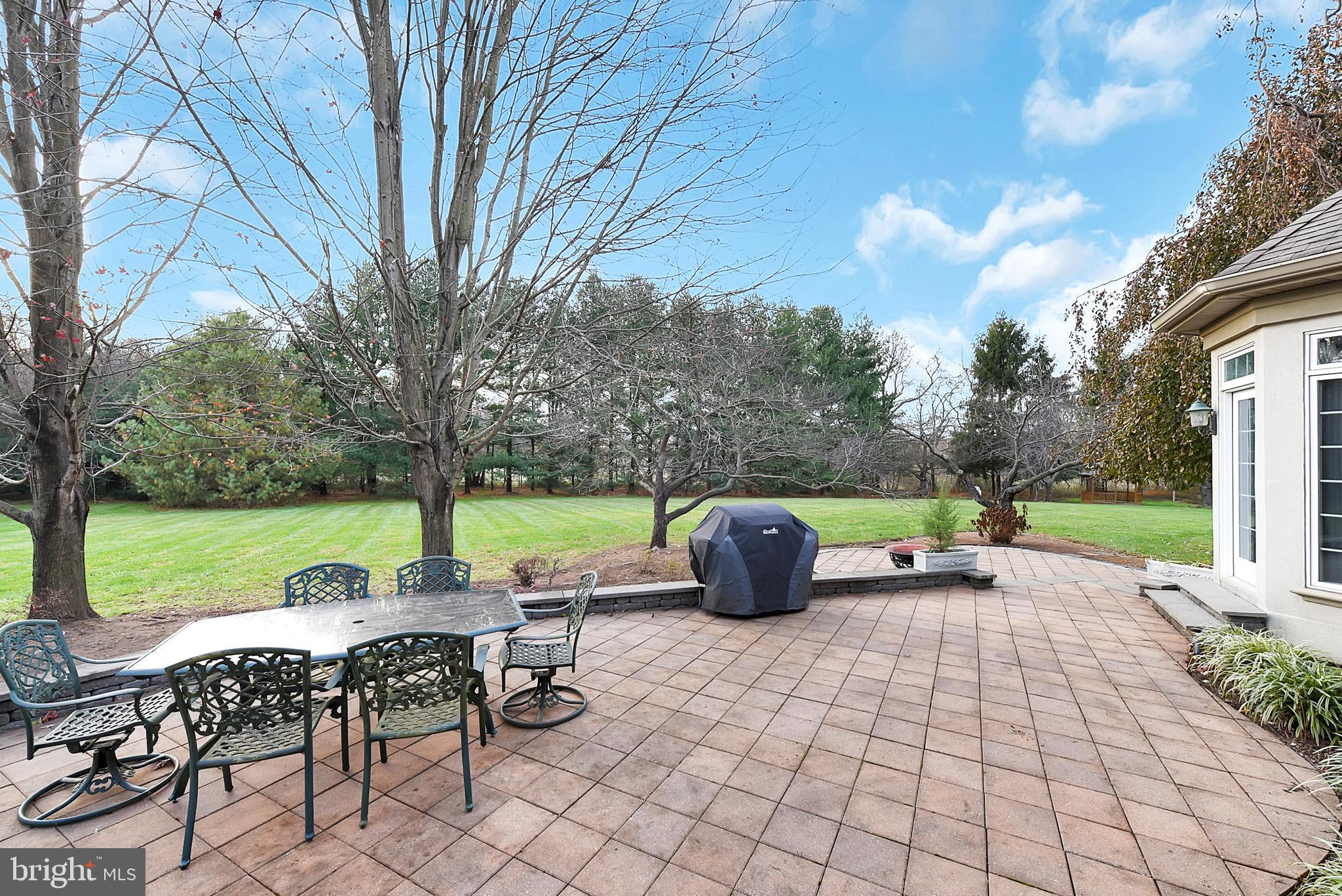 3919 Crosswicks Hamilton Square Road Trenton, NJ 08620 - Photo 33 of 61 a view of a swimming pool and lounge chairs in back yard of the house