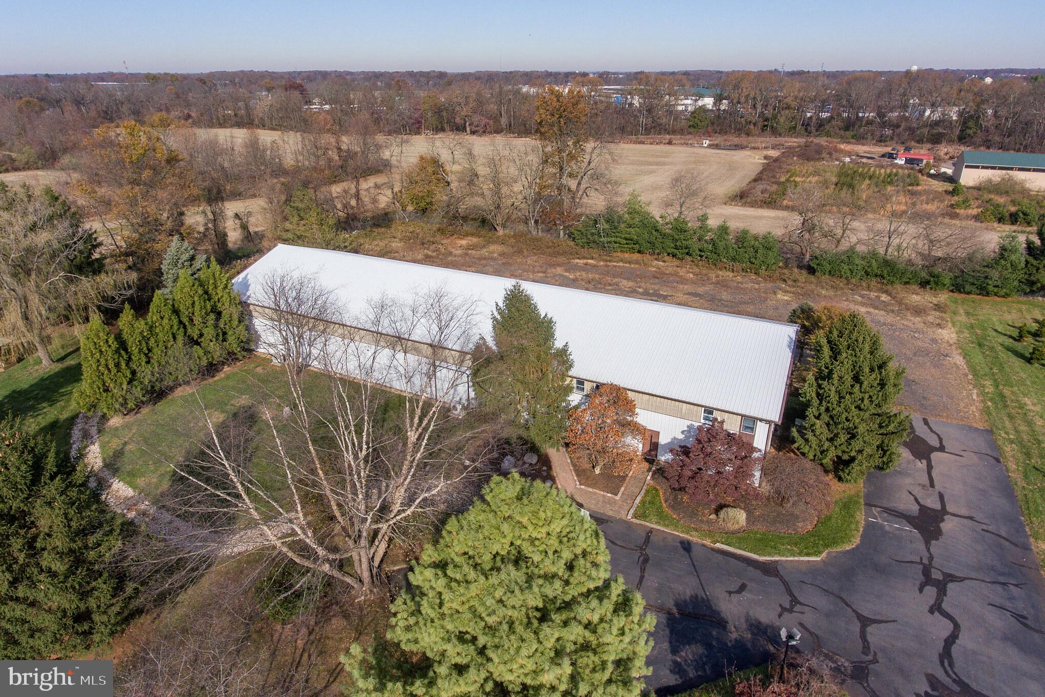 3919 Crosswicks Hamilton Square Road Trenton, NJ 08620 - Photo 51 of 61 an aerial view of a house with a yard and lake view