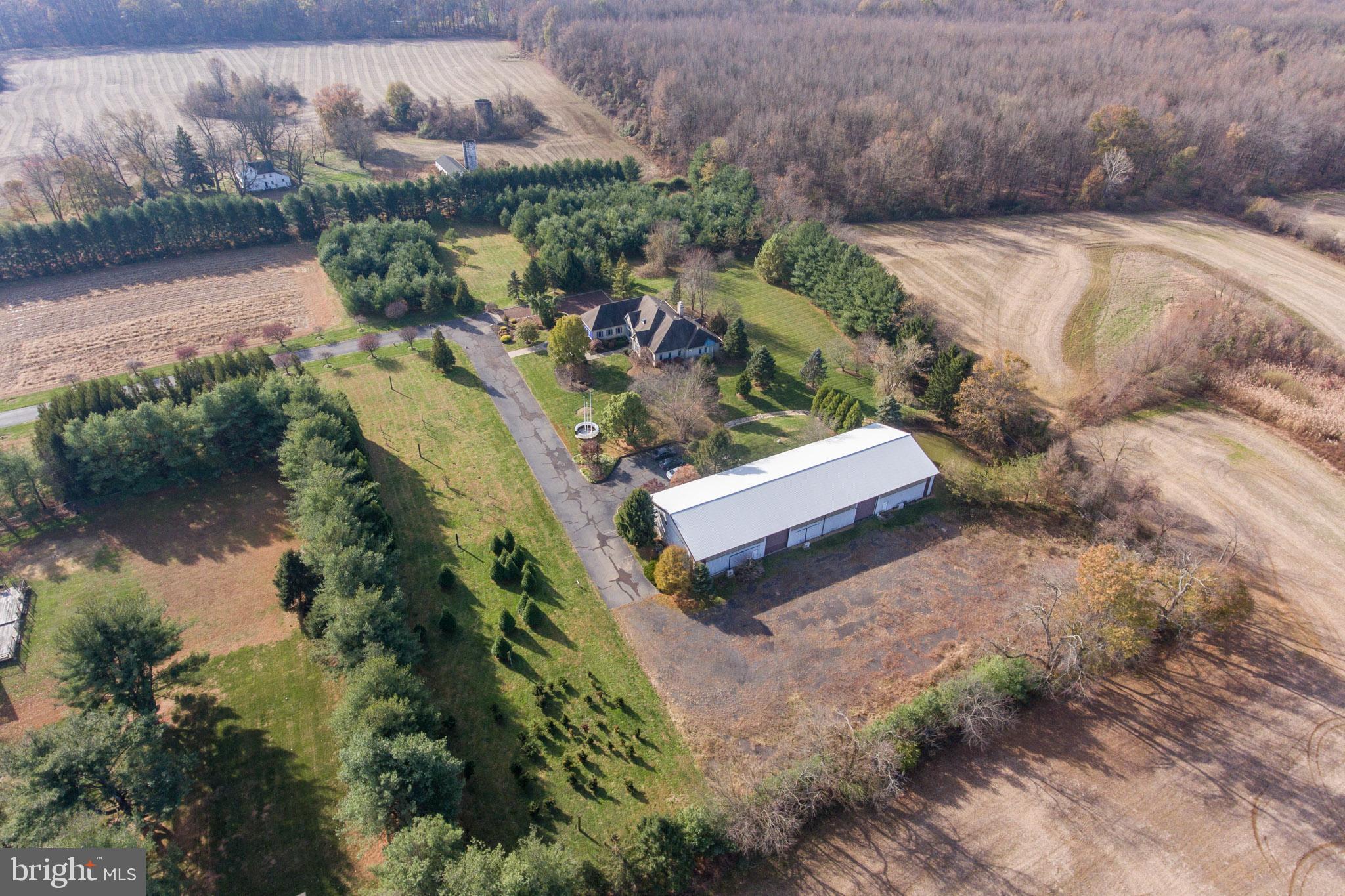 3919 Crosswicks Hamilton Square Road Trenton, NJ 08620 - Photo 57 of 61 an aerial view of a house with a yard and lake