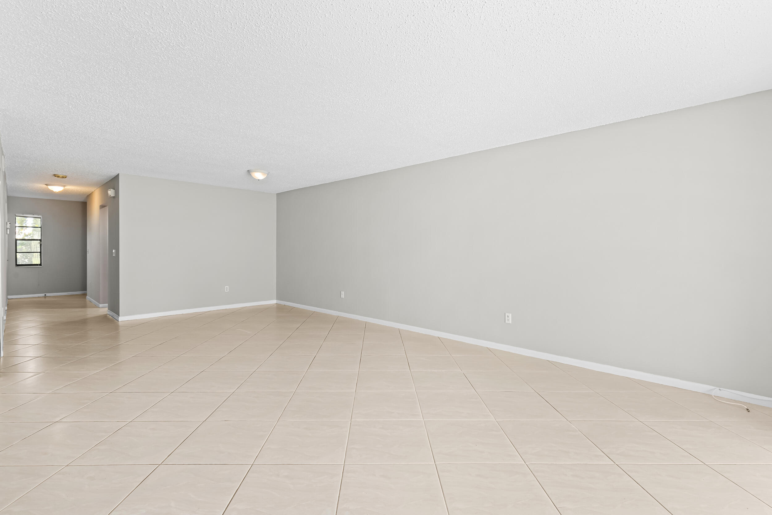 9270 Vista Del Lago, Unit E27 Boca Raton, FL 33428 - Photo 7 of 22 a view of an empty room