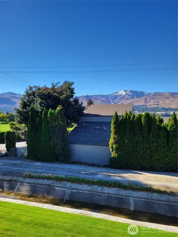 a view of a yard with an outdoor space