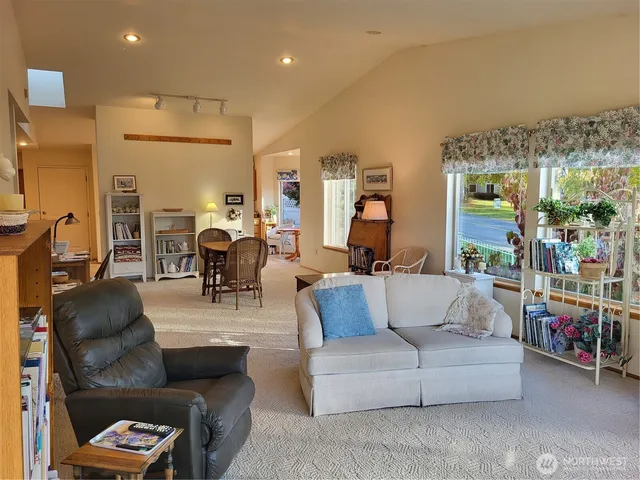 a view of a livingroom with furniture and a couch