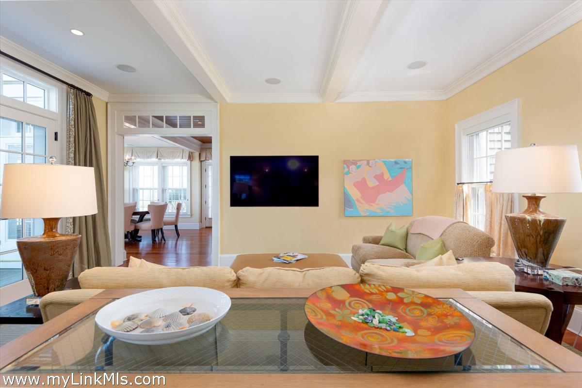 39 Cliff Road Nantucket, MA 02554 - Photo 9 of 46 a living room with furniture and a table