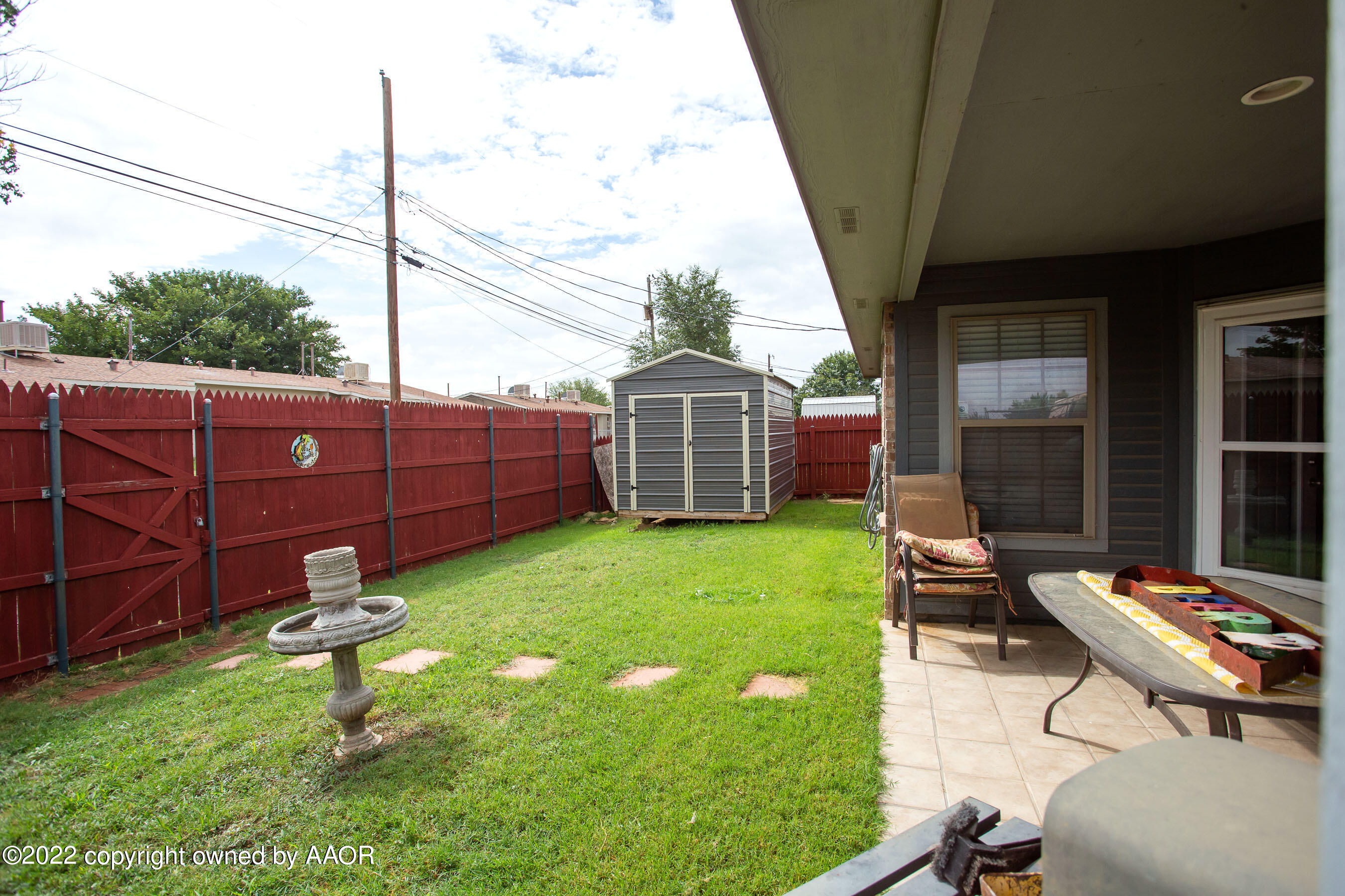 2601 Eagle Point Drive Amarillo, TX 79103 - Photo 21 of 23 a backyard of a house with seating space