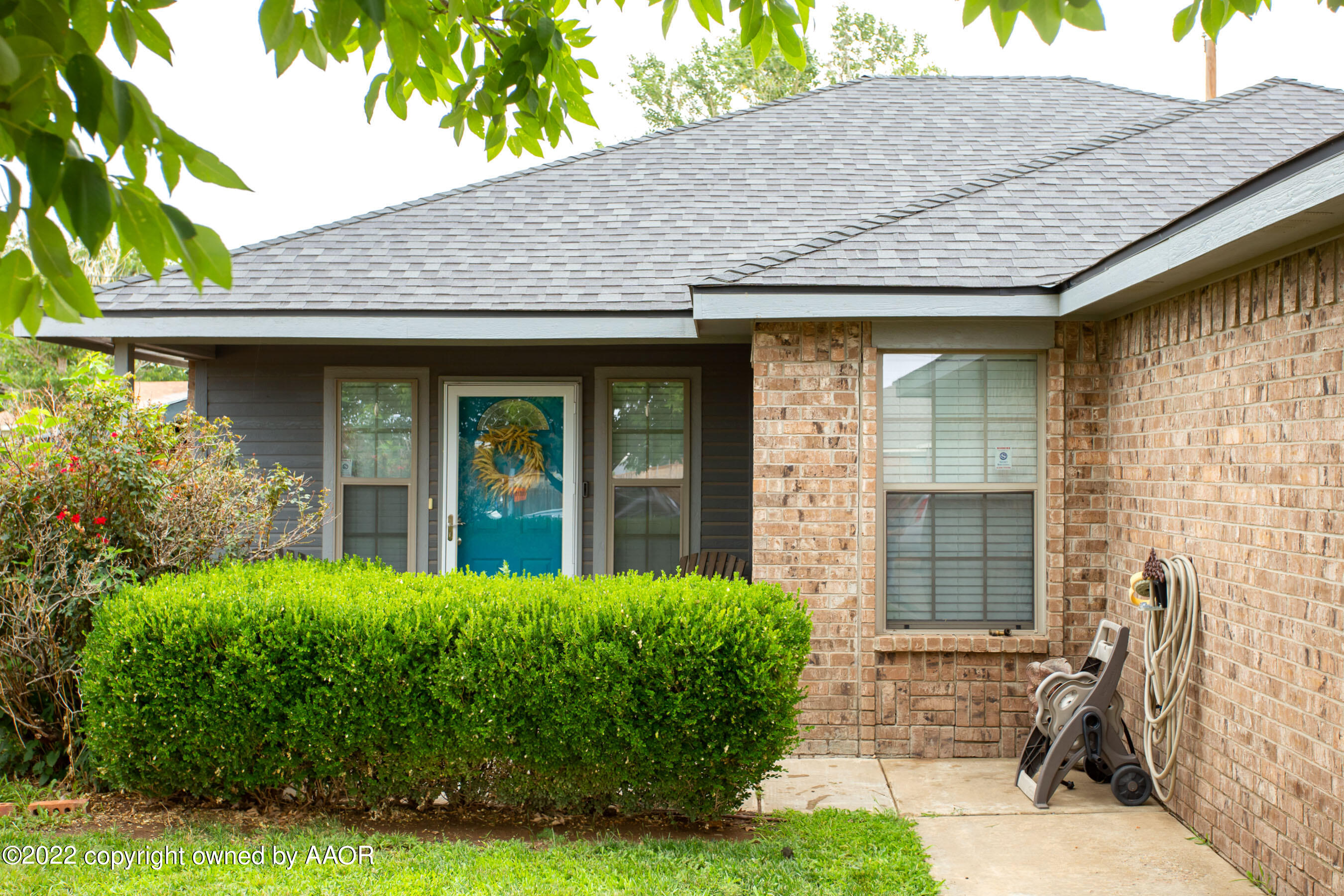 2601 Eagle Point Drive Amarillo, TX 79103 - Photo 3 of 23 a front view of a house with garden