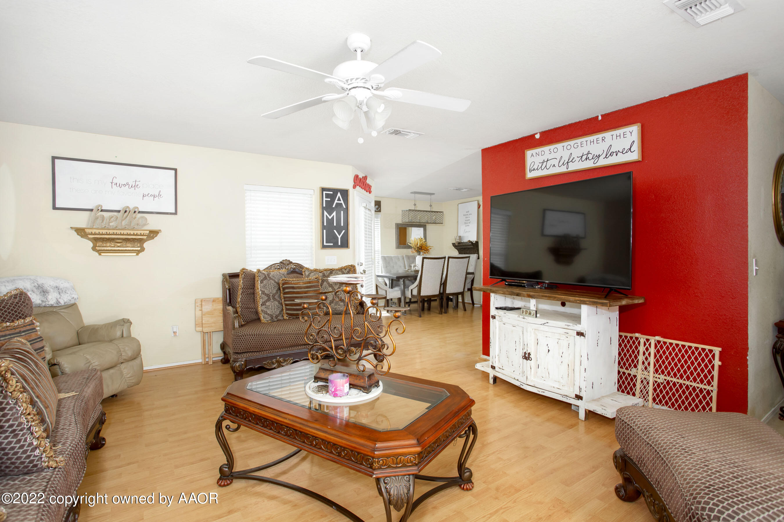 2601 Eagle Point Drive Amarillo, TX 79103 - Photo 10 of 23 a living room with furniture and a flat screen tv