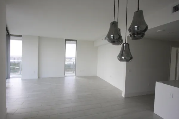 a view of a balcony with an ocean view