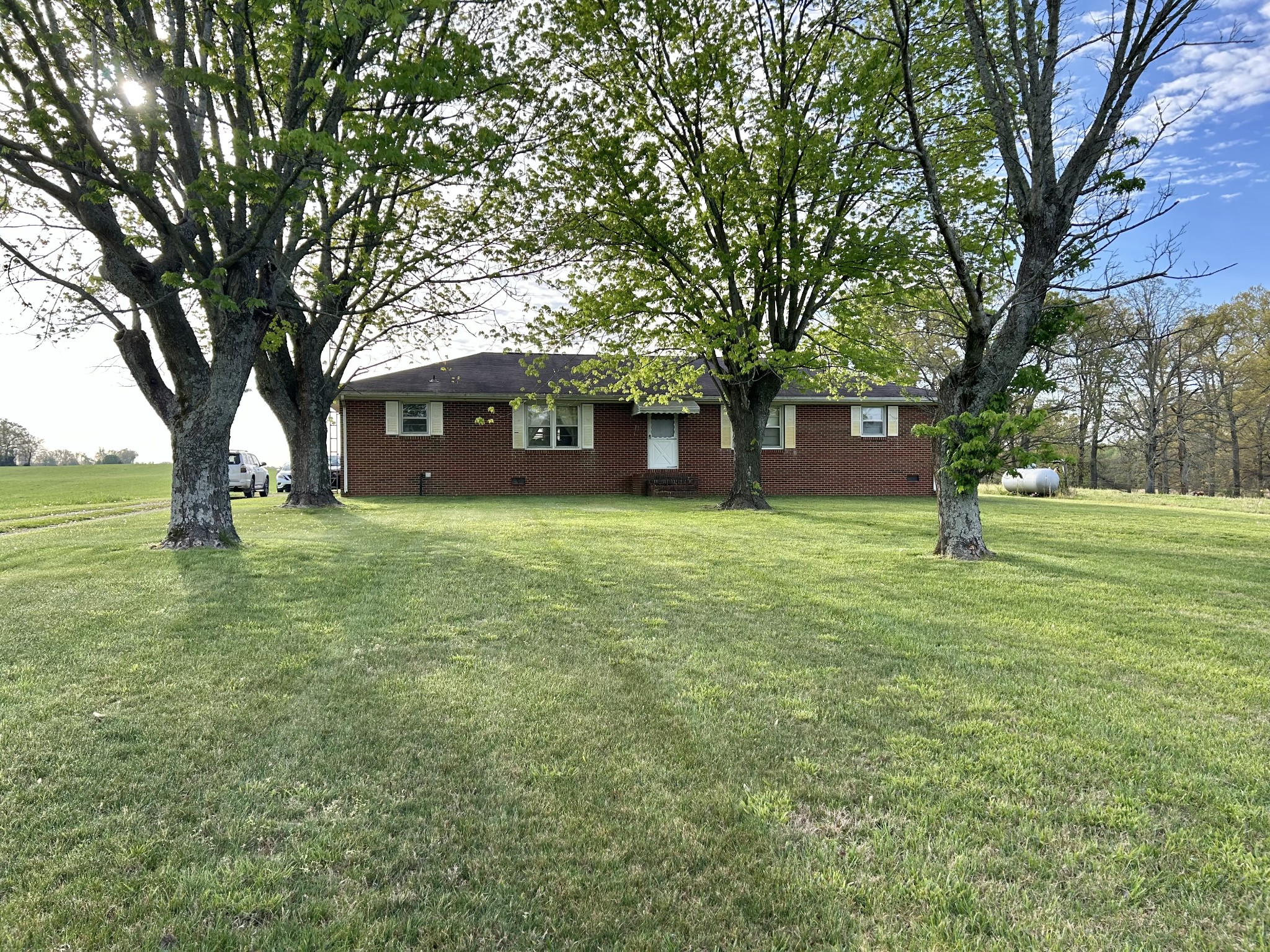 1110 Pomroy Road Manchester, TN 37355 - Photo 2 of 55 a view of a house with a yard