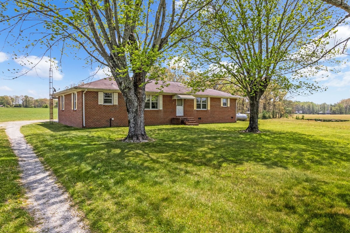 1110 Pomroy Road Manchester, TN 37355 - Photo 5 of 55 a front view of house with yard and green space