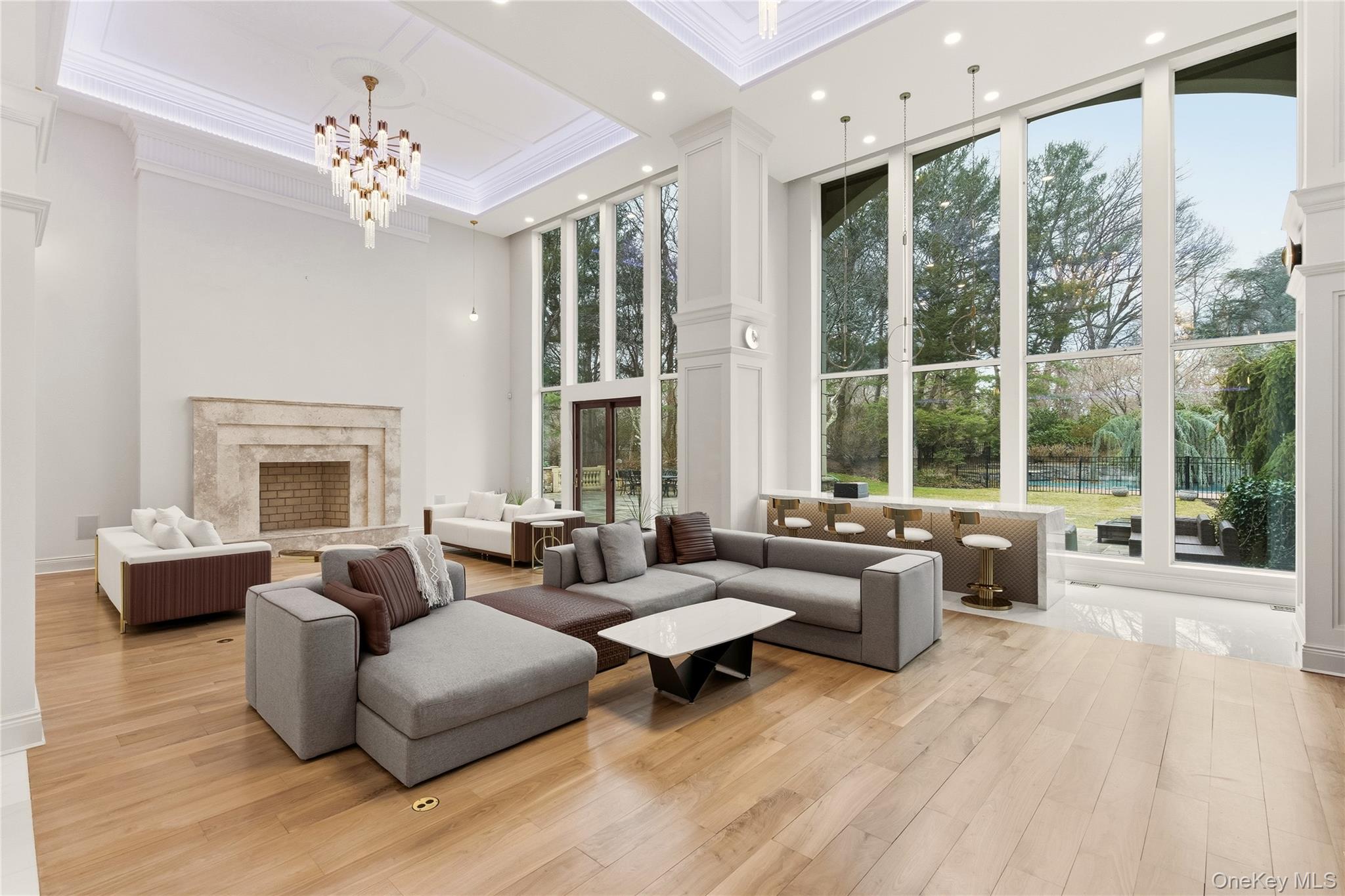 55 Coves Run Syosset, NY 11791 - Photo 5 of 50 a living room with furniture and a large window