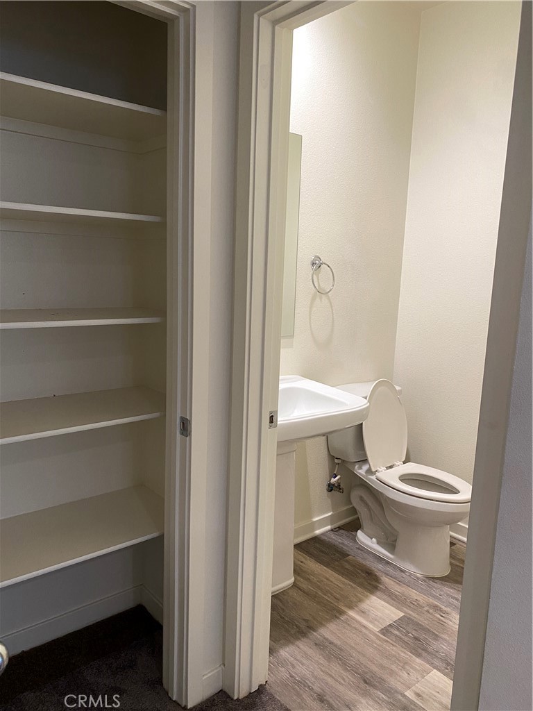 4232 West Ivesbrook Street Lancaster, CA 93536 - Photo 15 of 33 a bathroom with a toilet and a shower