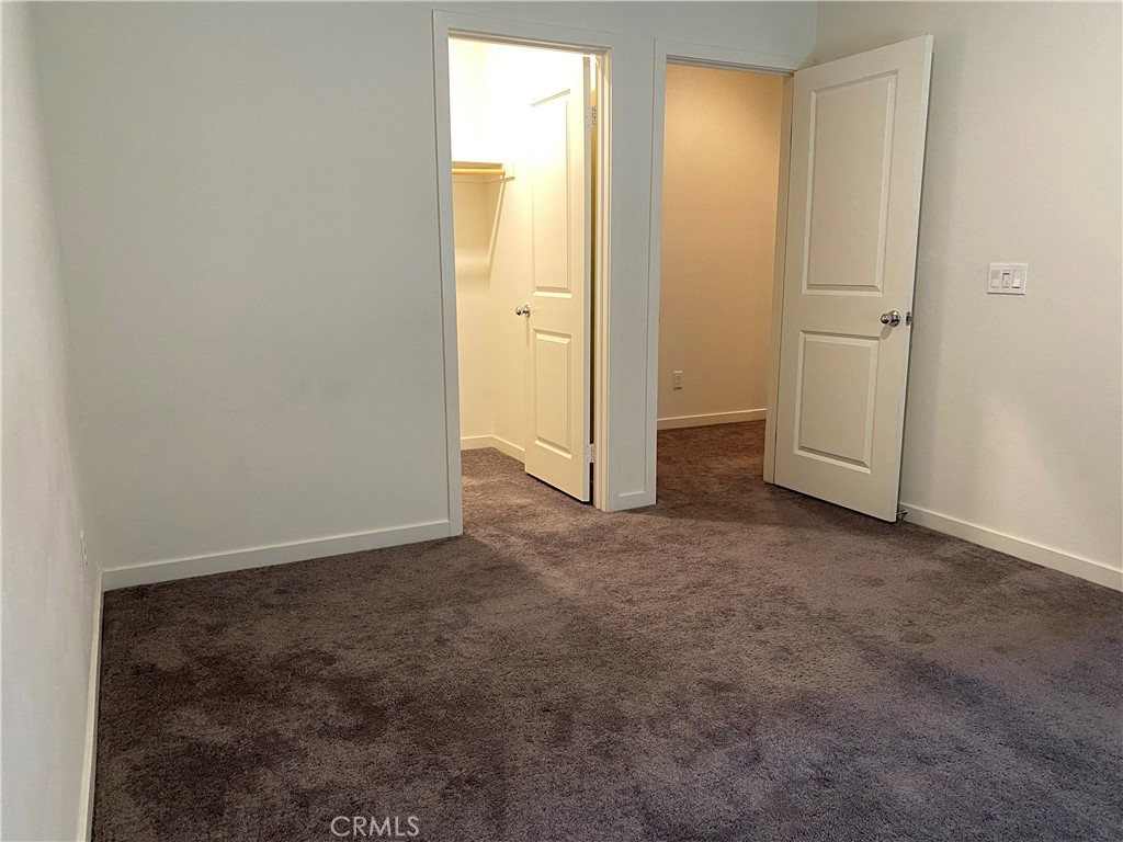 4232 West Ivesbrook Street Lancaster, CA 93536 - Photo 22 of 33 an empty room with windows