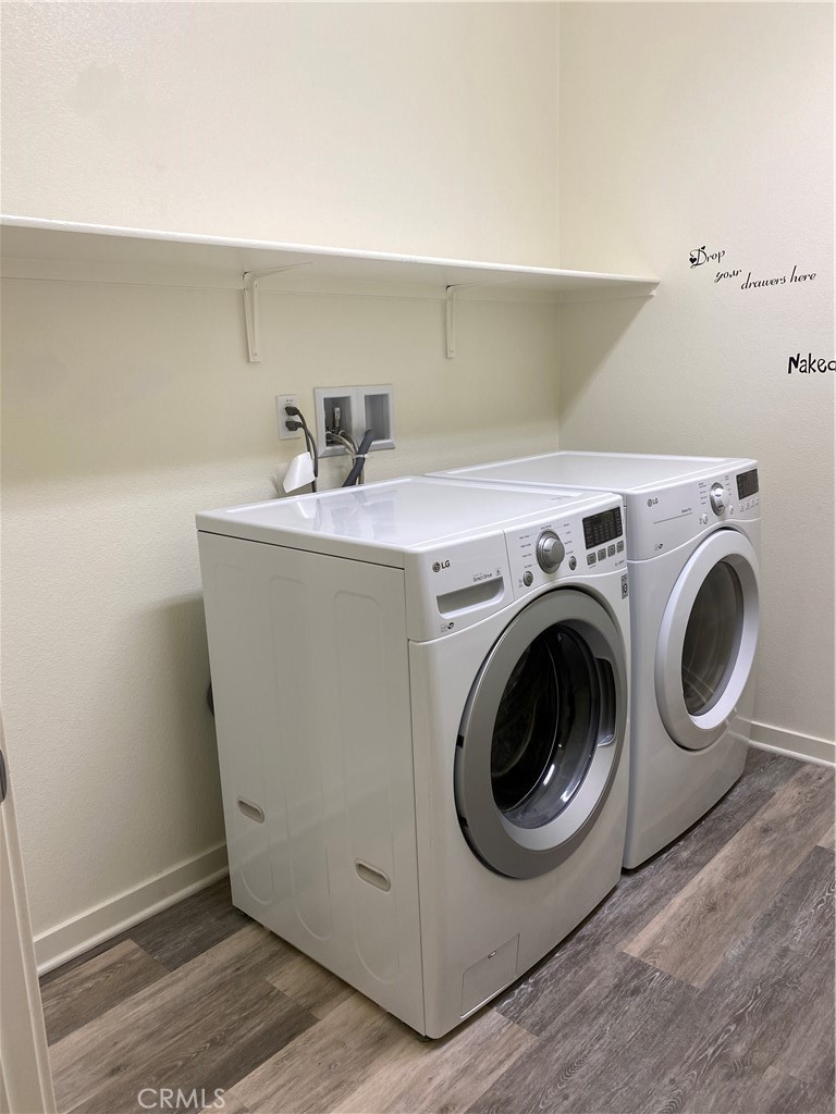 4232 West Ivesbrook Street Lancaster, CA 93536 - Photo 26 of 33 a utility room with dryer and washer