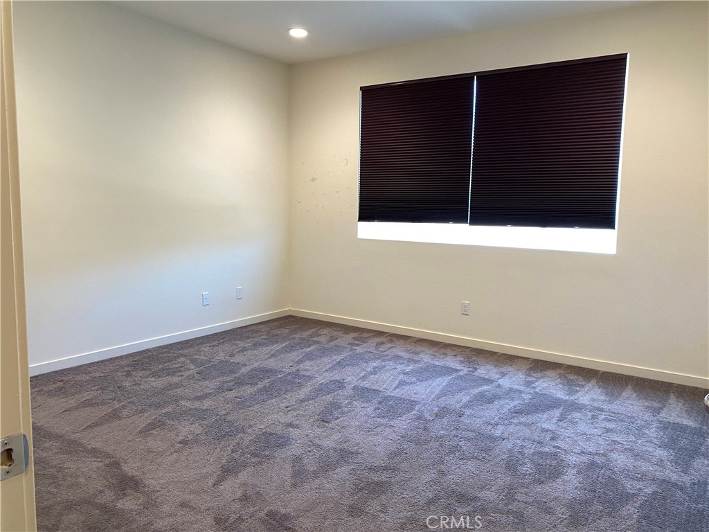 4232 West Ivesbrook Street Lancaster, CA 93536 - Photo 8 of 33 wooden floor in an empty room
