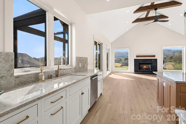 a bathroom with double sink and a mirror