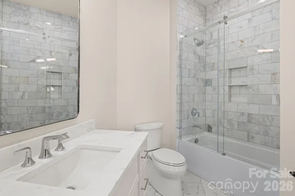 a view of a balcony with wooden floor