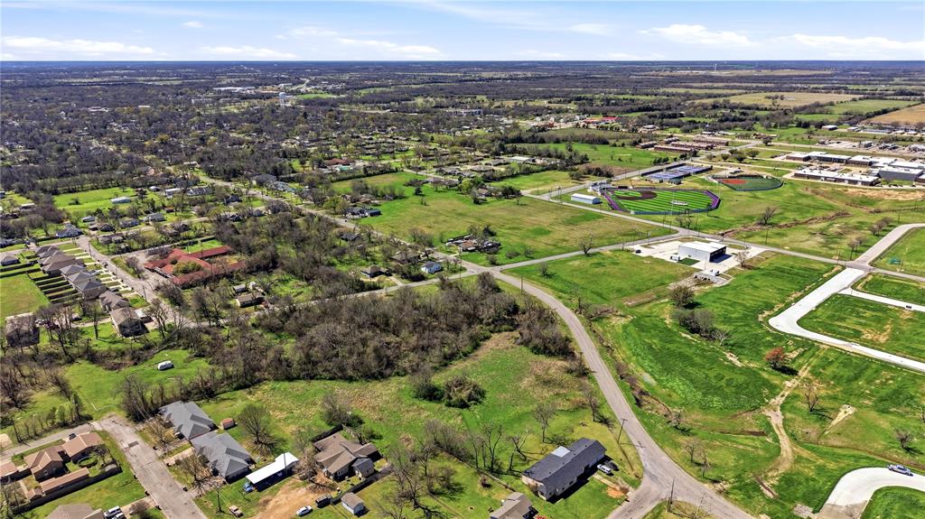 1700 Agnew Street Bonham, TX 75418 - Photo 13 of 14 an aerial view of residential houses with outdoor space