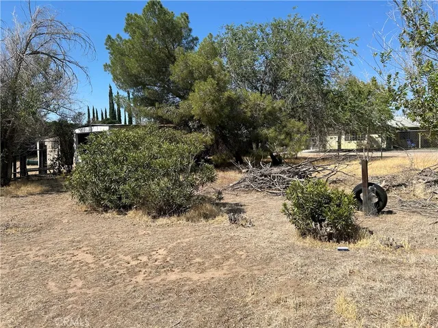 a view of a covered with snow in the yard