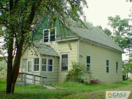 44 Old Georgetown Road Princeton, NJ 08540 - Photo 2 of 2 a front view of a house with a yard
