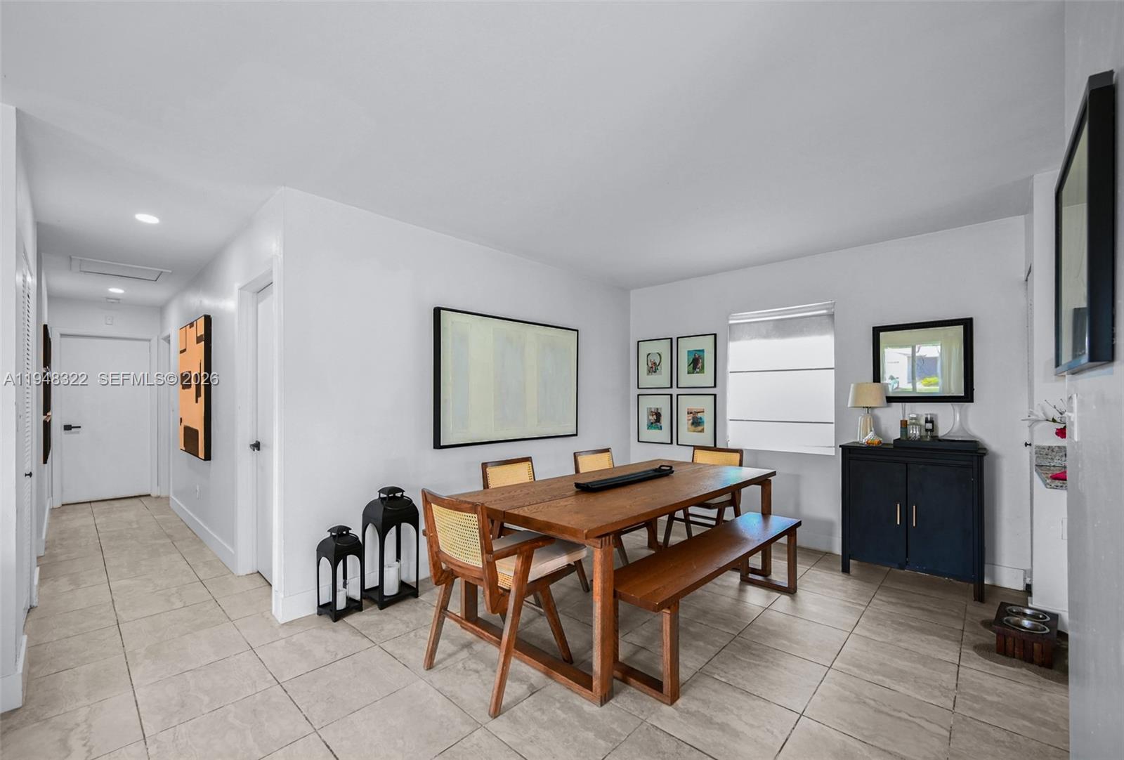 8780 Southwest 200th Terrace Cutler Bay, FL 33189 - Photo 7 of 39 a dining room with furniture and window