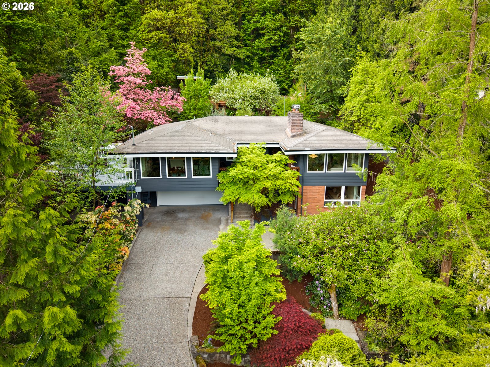 4000 Southeast Aldercrest Road Milwaukie, OR 97222 - Photo 1 of 48 a front view of a house with a yard