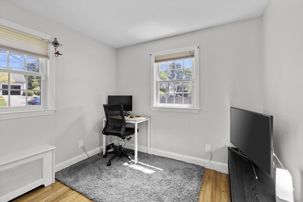15 Dee Road Lexington, MA 02420 - Photo 12 of 34 a view of a workspace with furniture and a window