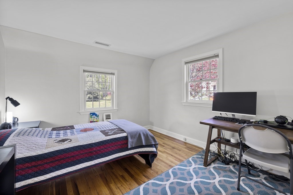 15 Dee Road Lexington, MA 02420 - Photo 14 of 34 a bedroom with a bed and a desk